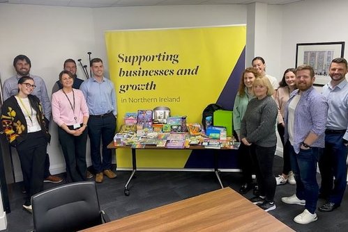 Belfast colleagues with back to school donations