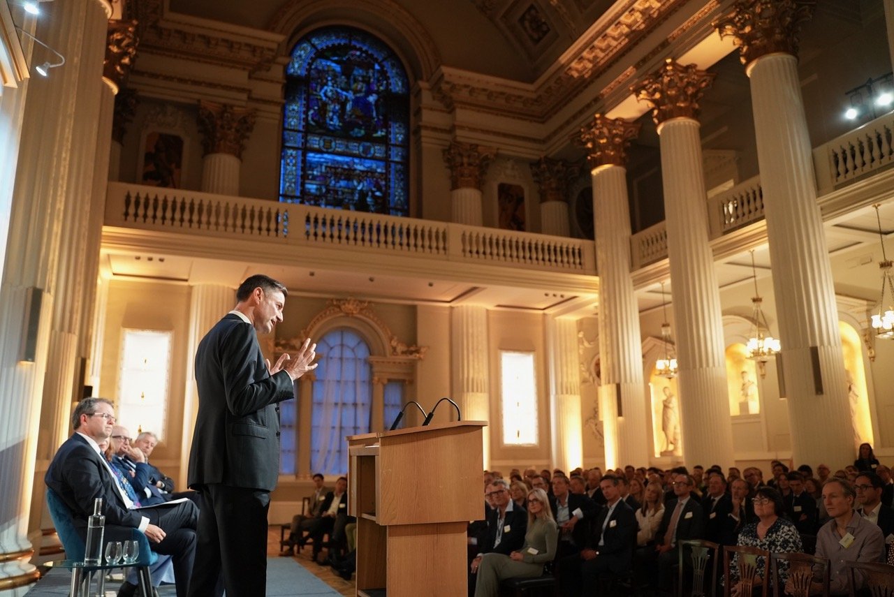 Our CEO speaks to the room at the event