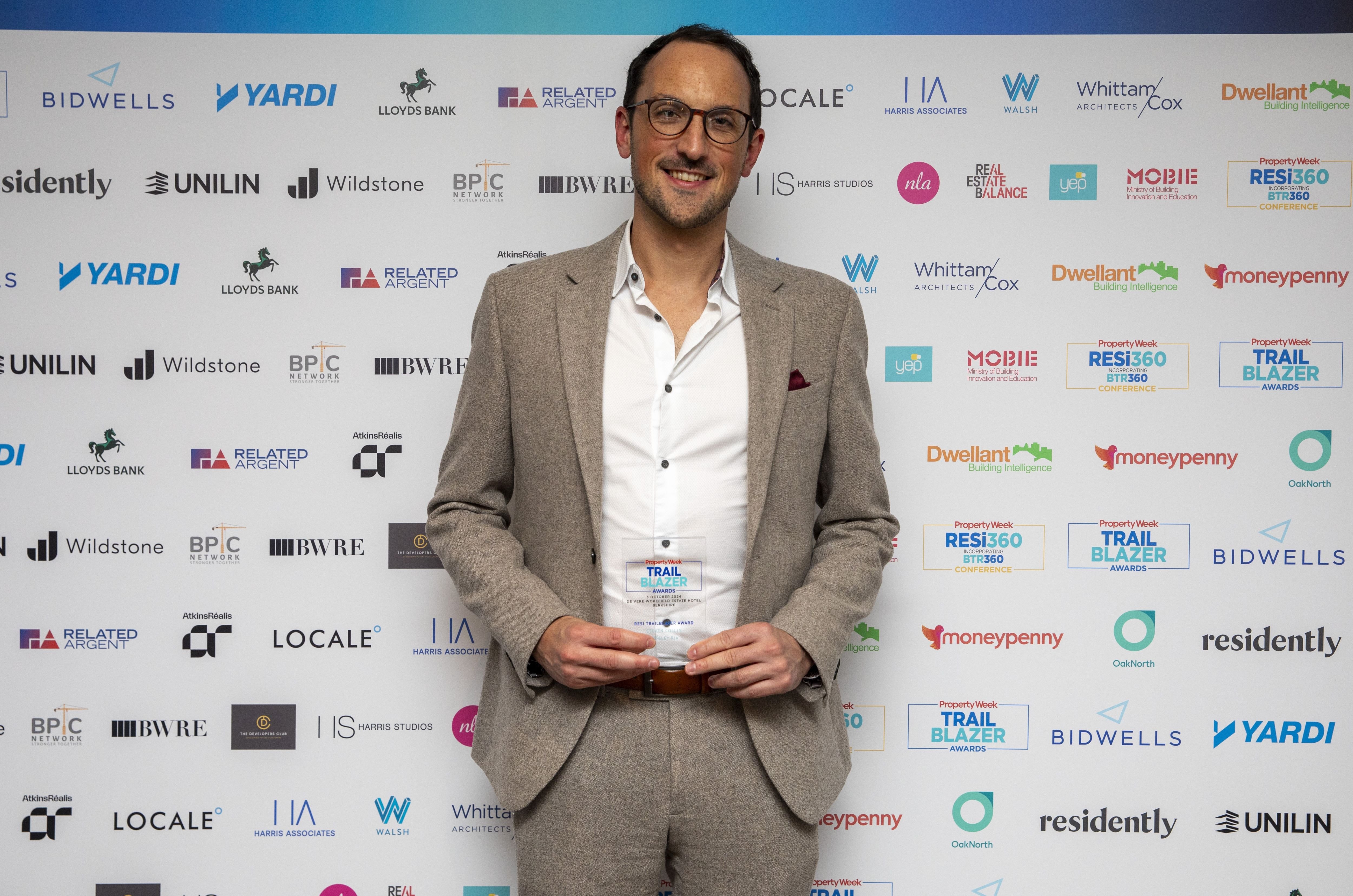 Photo of Steven Collin with Property Week’s ‘RESi Trailblazers’ 2024 award