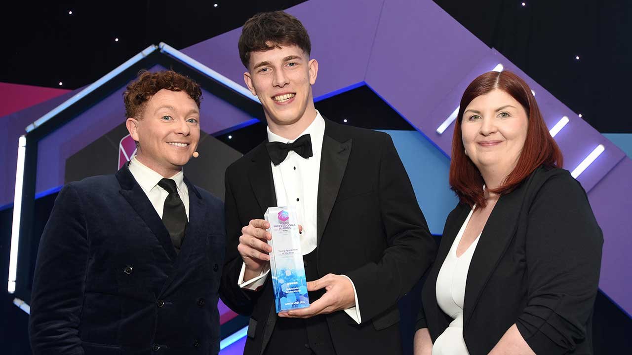 Photo of Gabriel John winning Young Apprentice of the Year award