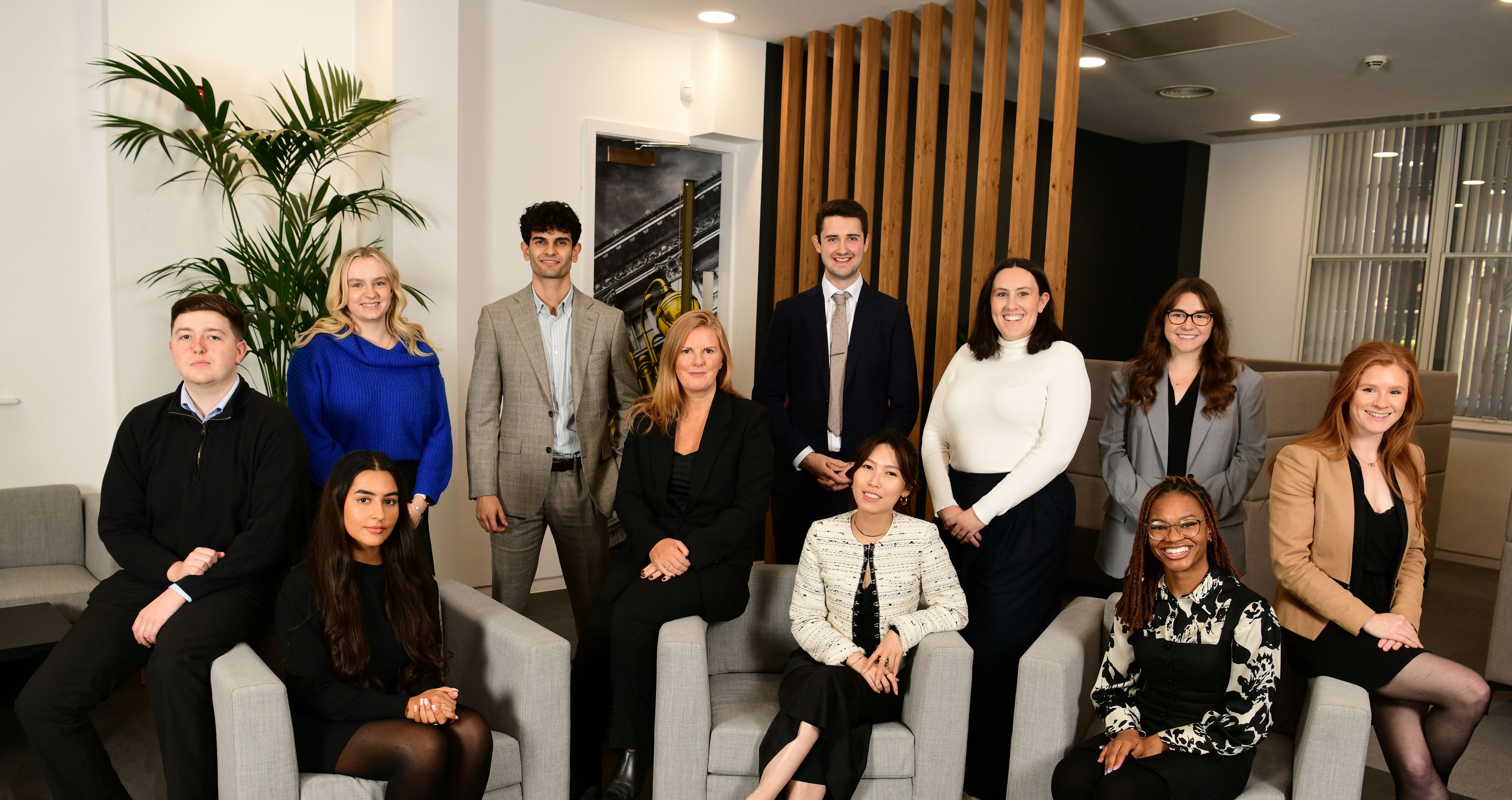 Photo of newly qualified solicitors and trainees in our Birmingham office.