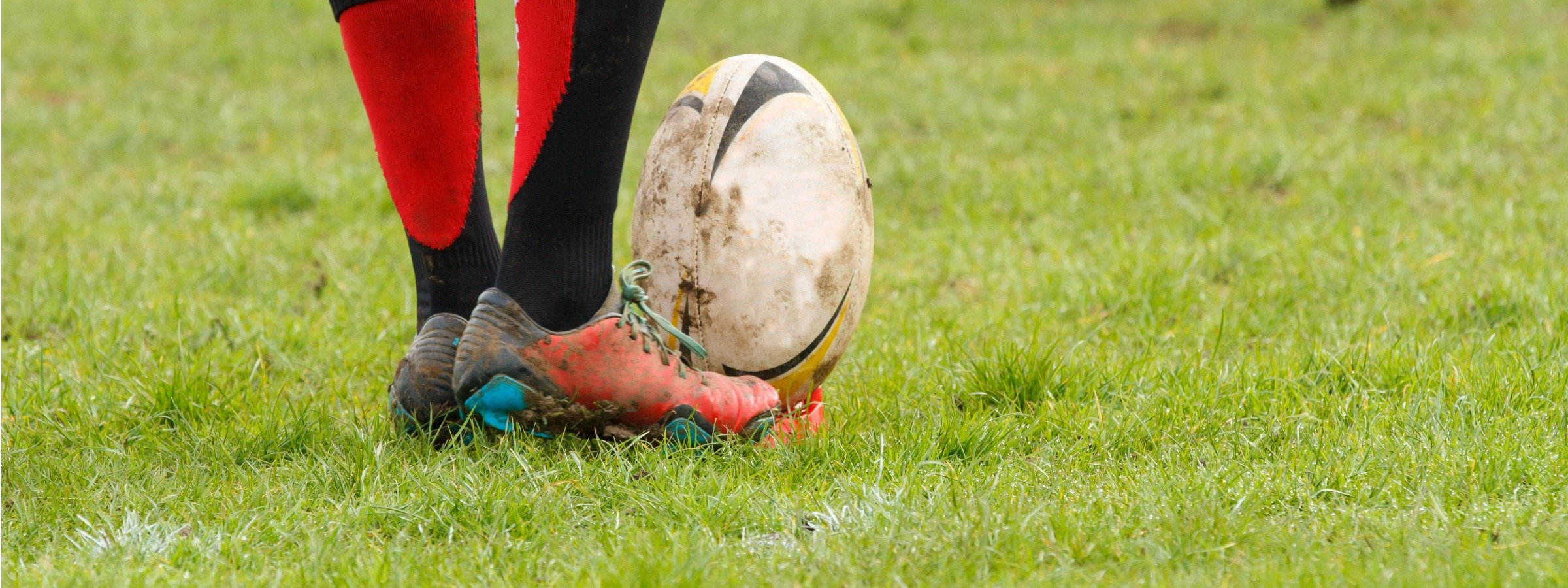 Photo of rugby ball and feet