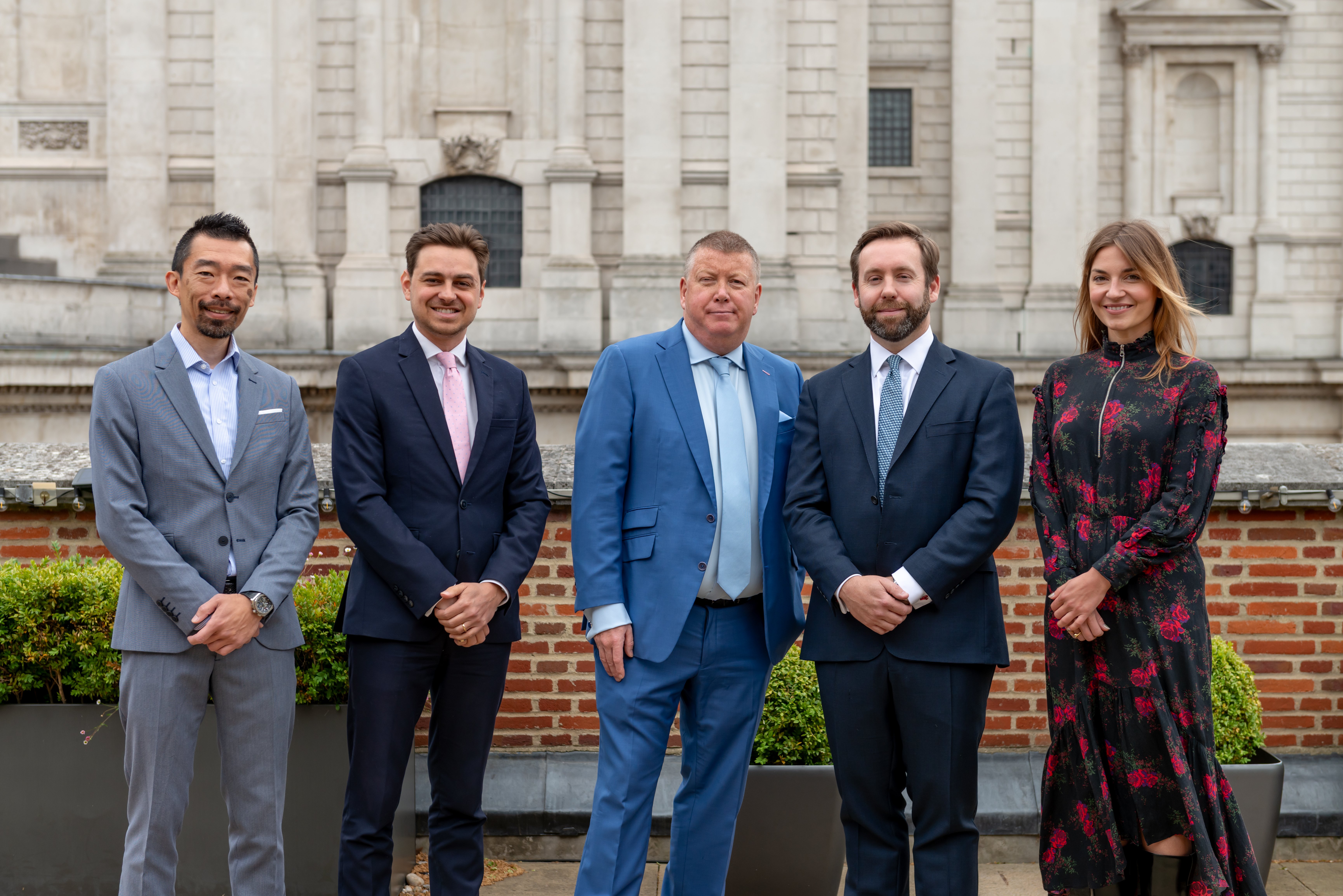 Photo of promoted colleagues in London office 2025